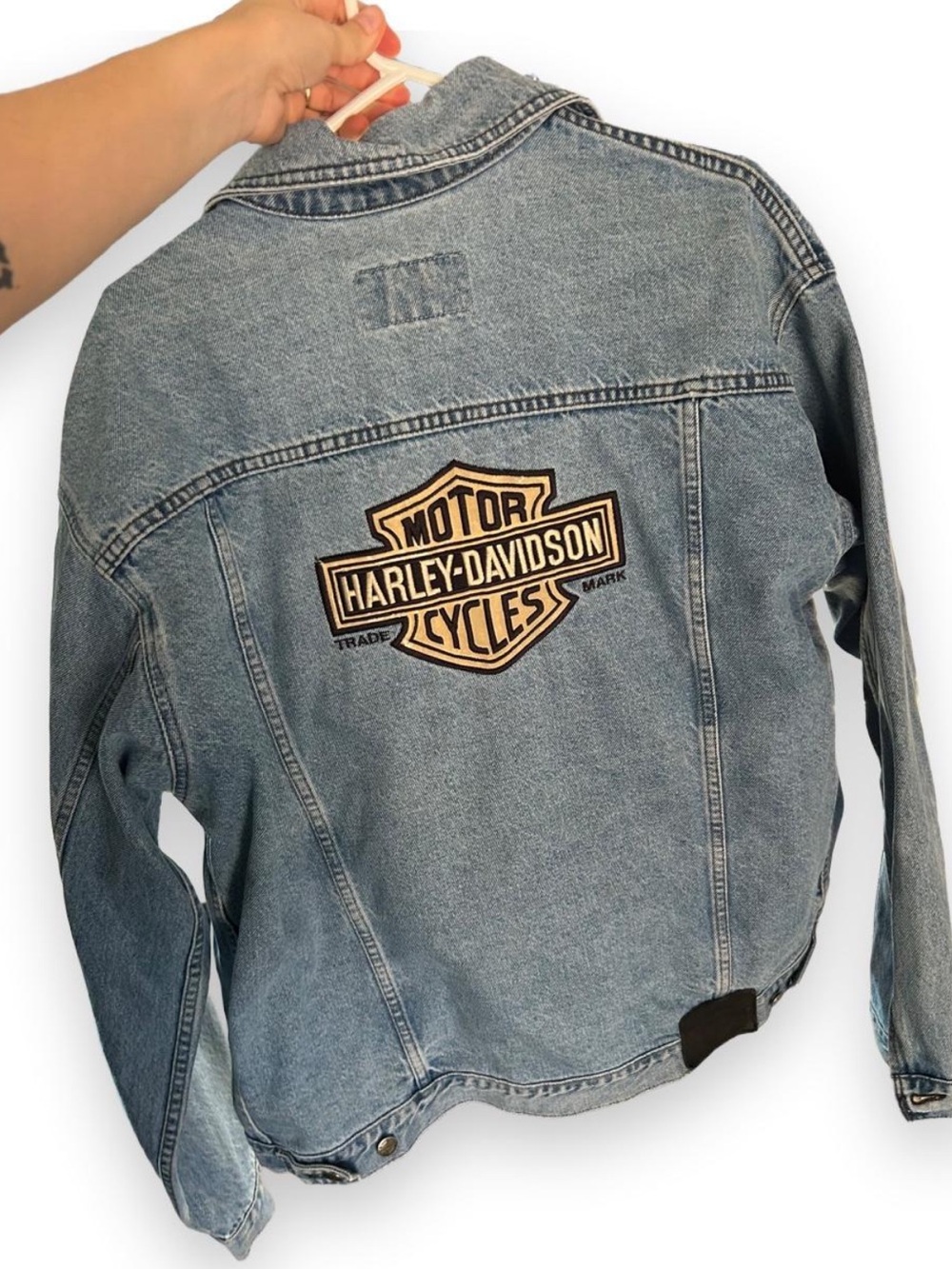 True Harley Davidson denim jacket with beige and black embroidery. Size M.